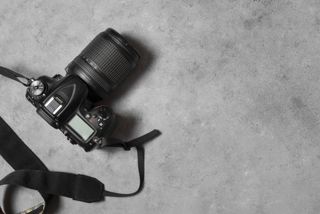 Top View Photo Camera Indoors Still Life 1024x684